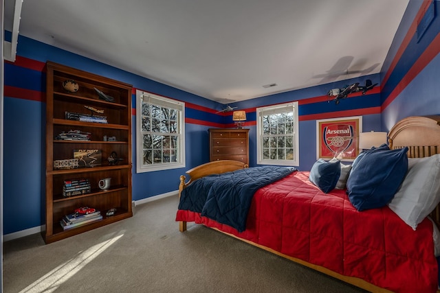 bedroom with visible vents, baseboards, and carpet floors