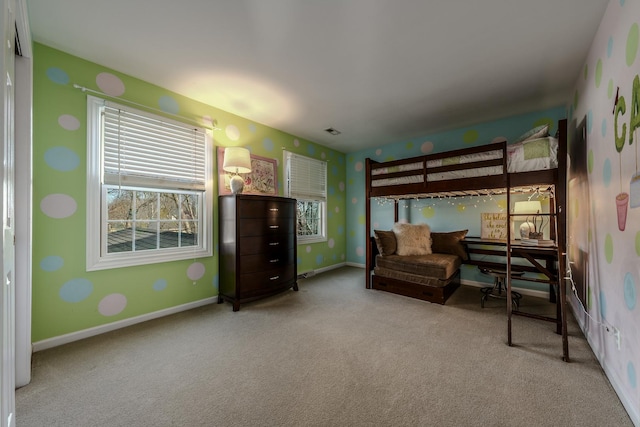 bedroom featuring visible vents, carpet, and baseboards