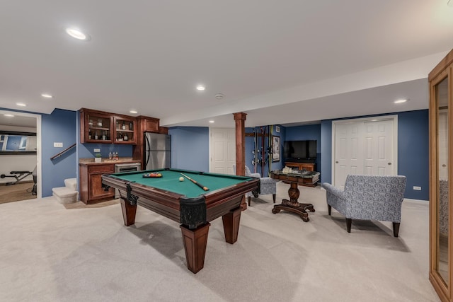 playroom with recessed lighting, light carpet, and indoor bar