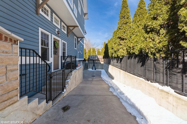 view of patio featuring fence