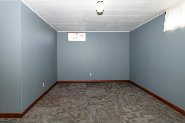 basement with carpet and baseboards