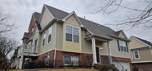 exterior space with brick siding