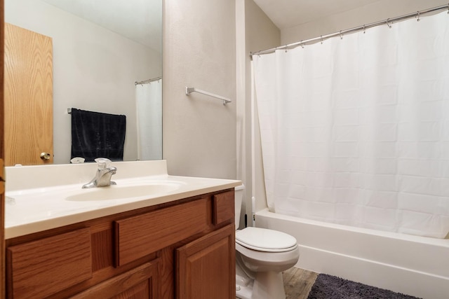 full bathroom with vanity, wood finished floors, shower / bath combination with curtain, and toilet