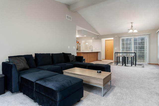 living room with light colored carpet, visible vents, high vaulted ceiling, beamed ceiling, and baseboards