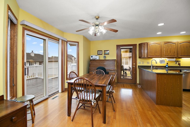 dining space featuring recessed lighting, a ceiling fan, and light wood-style floors