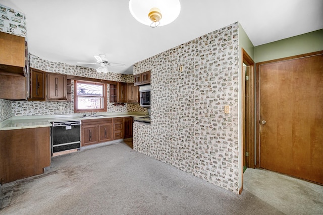 kitchen with black dishwasher, open shelves, light countertops, decorative backsplash, and ceiling fan