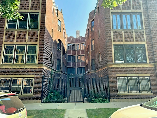 view of building exterior featuring fence