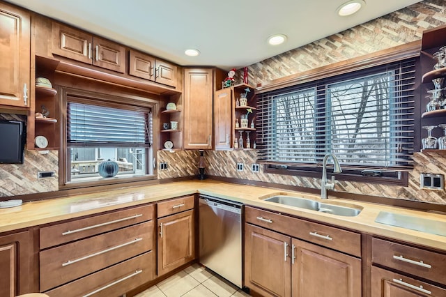 kitchen featuring a sink, wood counters, open shelves, and dishwasher