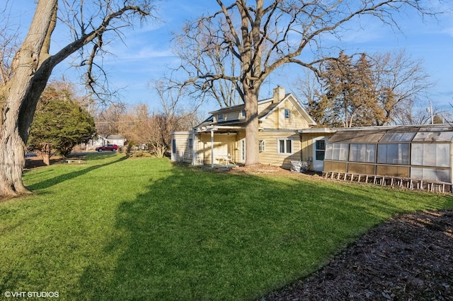 view of yard featuring an exterior structure