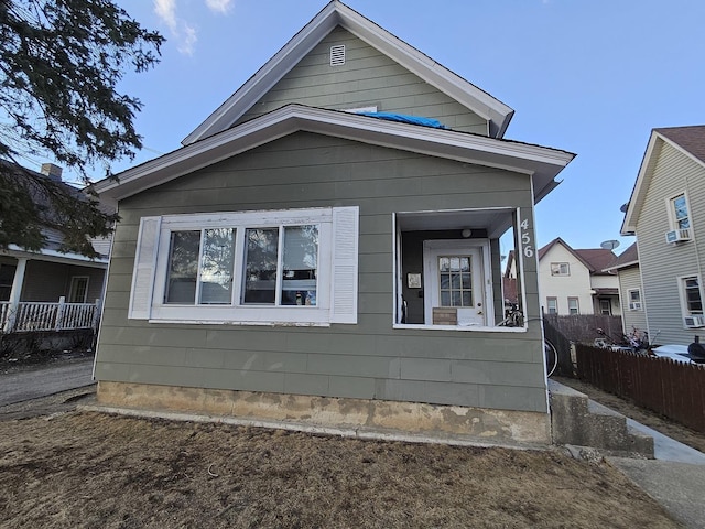 view of side of property with fence