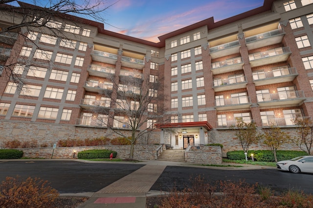 view of property at dusk