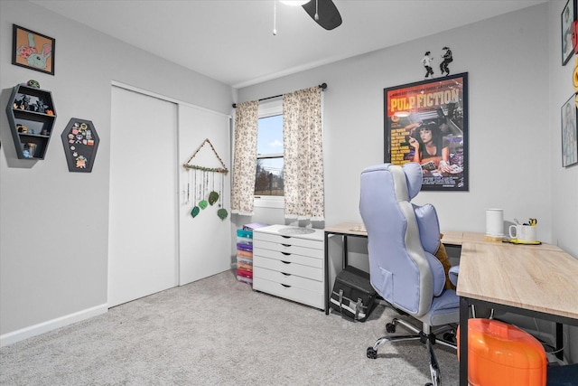 office area featuring ceiling fan and carpet floors