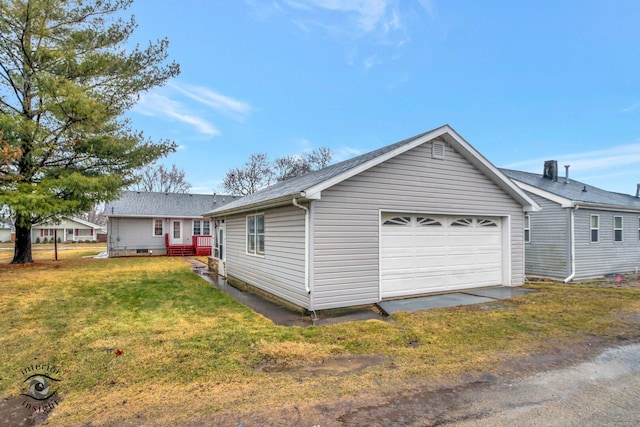 view of side of home with a yard