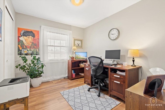 office area featuring light wood finished floors