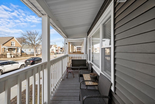 balcony featuring a residential view