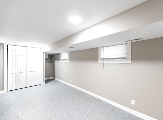 below grade area featuring visible vents and baseboards