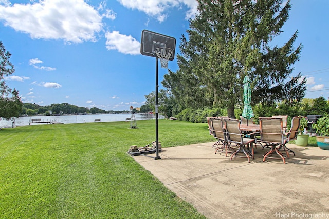 view of patio / terrace with a water view