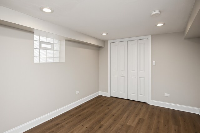 8837 S Throop St, Chicago, IL 60620 - finished below grade area with baseboards, dark wood-type flooring, and recessed lighting