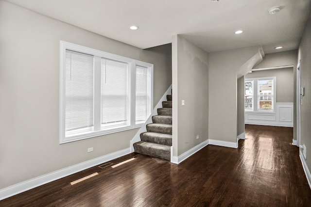8837 S Throop St, Chicago, IL 60620 - interior space featuring wood finished floors, stairs, recessed lighting, arched walkways, and baseboards
