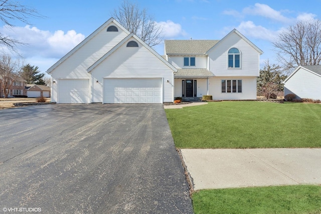 traditional-style house featuring a garage, a front lawn, roof with shingles, and driveway