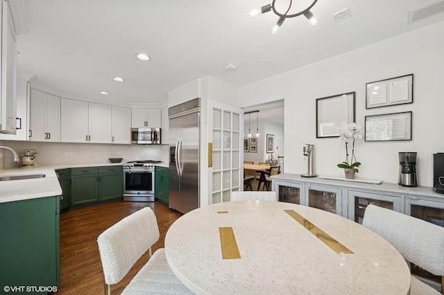 dining area with recessed lighting, visible vents, a chandelier, and dark wood-style flooring