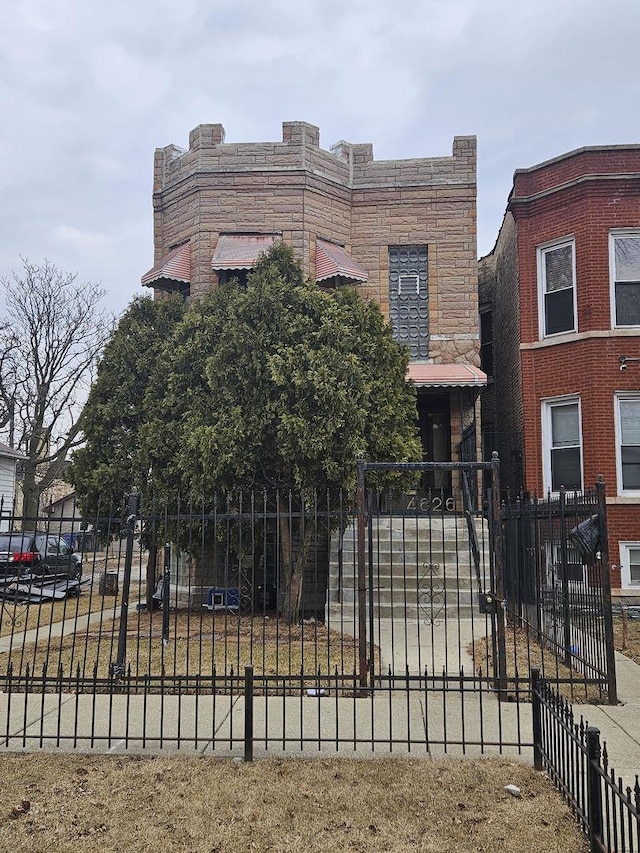 view of front of property with fence