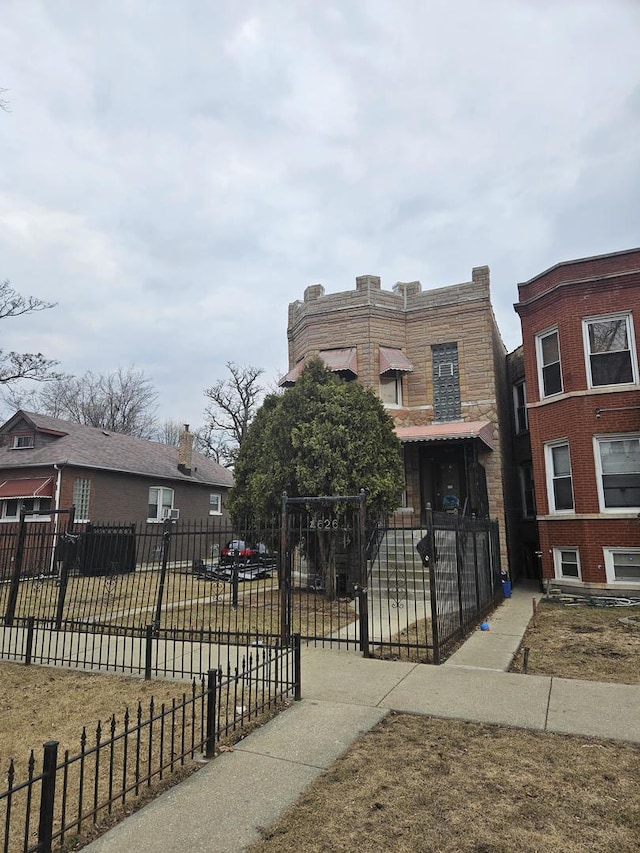 view of front of home with fence