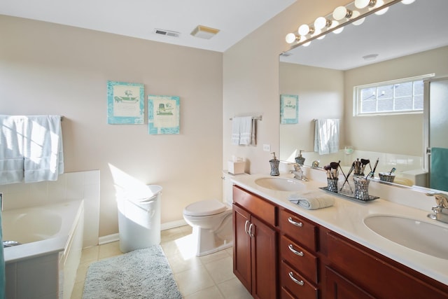 bathroom featuring double vanity, visible vents, a sink, and a bath