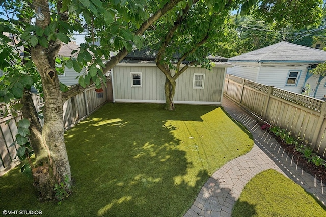 view of yard with a fenced backyard