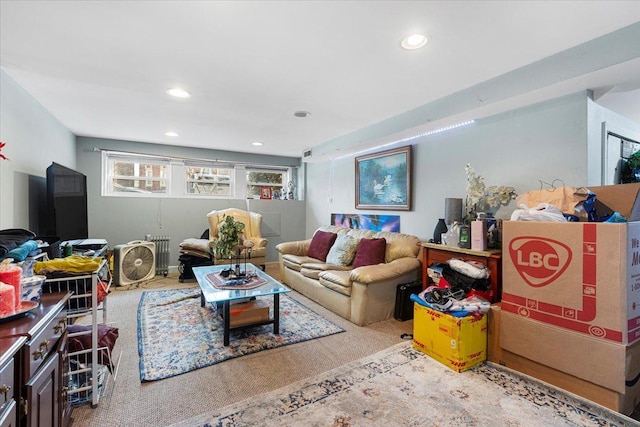 living room featuring carpet floors and recessed lighting