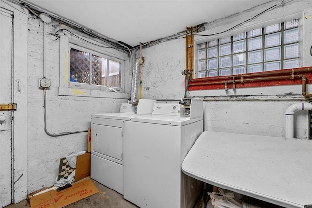 laundry room featuring washer and clothes dryer