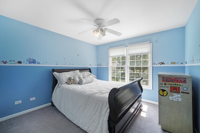 bedroom featuring carpet flooring, ceiling fan, and baseboards