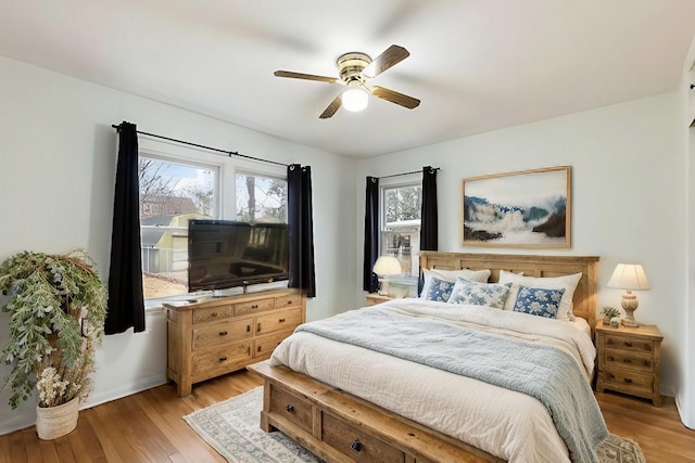 bedroom featuring ceiling fan and light wood-style floors