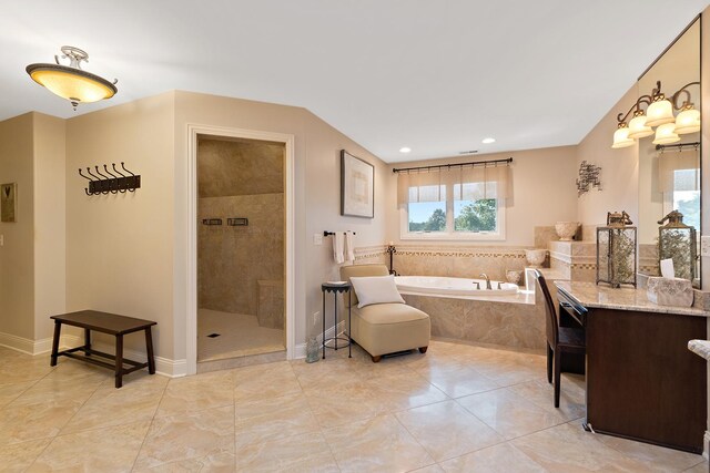 full bathroom featuring tiled shower, tile patterned floors, vanity, a bath, and recessed lighting