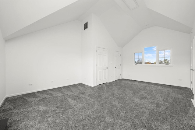 additional living space featuring high vaulted ceiling, baseboards, visible vents, and dark colored carpet