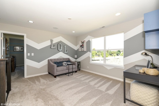 living area with recessed lighting, carpet flooring, visible vents, and baseboards