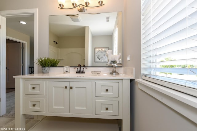 bathroom featuring visible vents and vanity