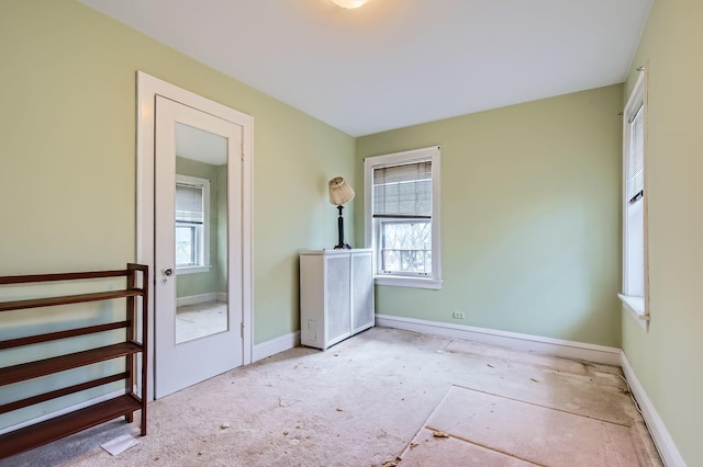 unfurnished bedroom featuring baseboards