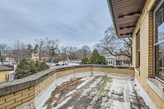 view of patio featuring a residential view and a balcony