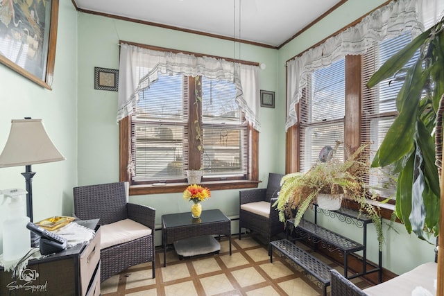 living area featuring crown molding and tile patterned floors