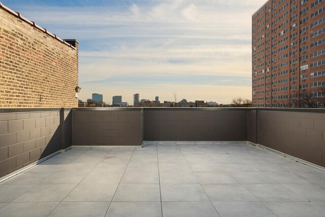 view of patio featuring a city view