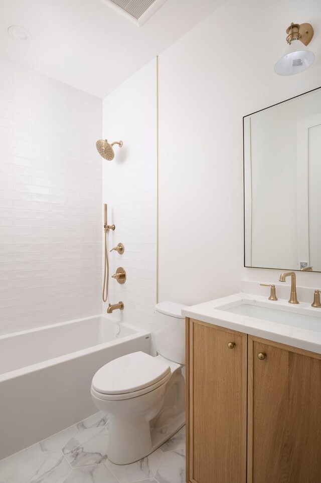 bathroom featuring vanity, visible vents, marble finish floor, toilet, and shower / washtub combination