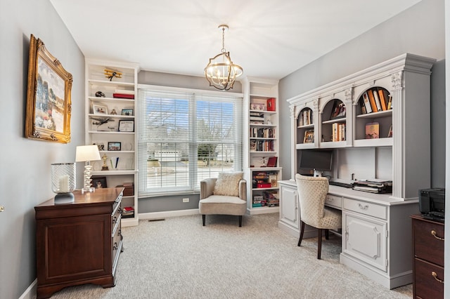 office area featuring light carpet, a notable chandelier, and baseboards