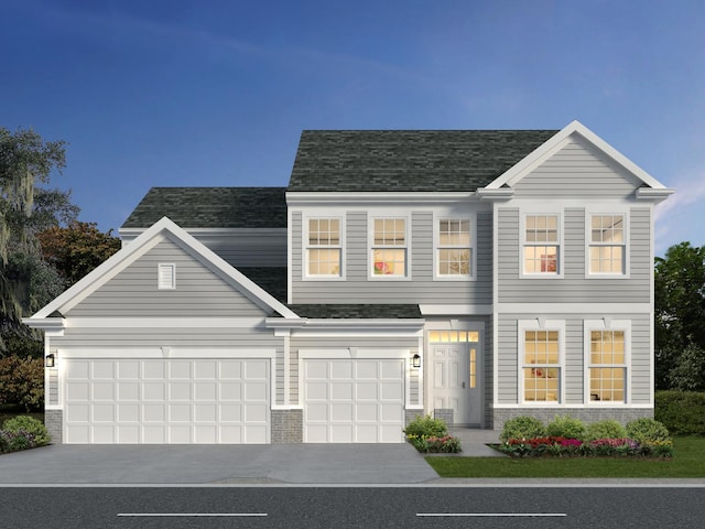 view of front of property with a garage, brick siding, and driveway