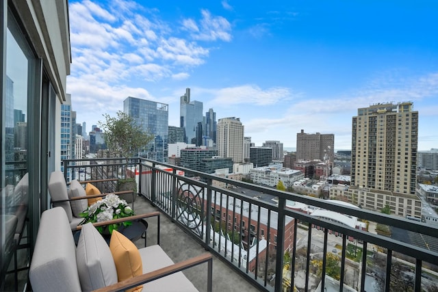 balcony featuring a view of city