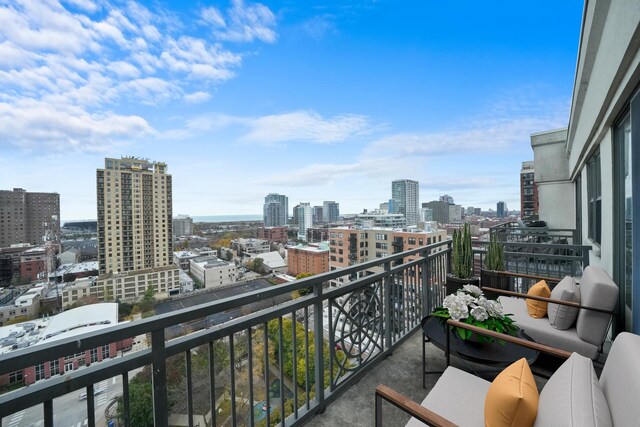 balcony featuring a view of city