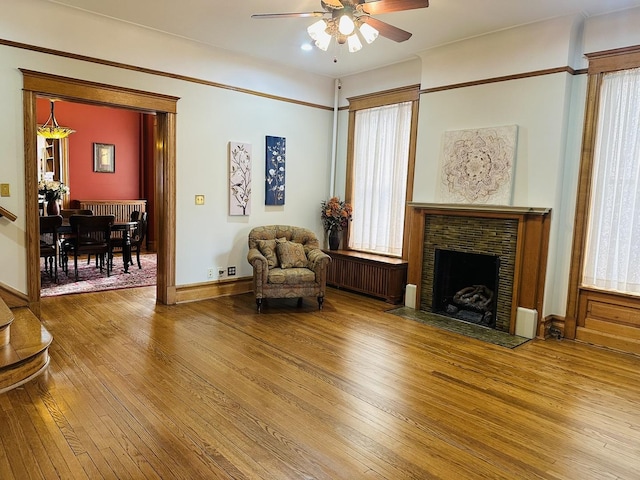 living area with hardwood / wood-style flooring and a wealth of natural light