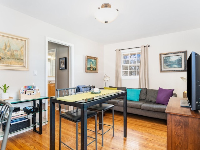 dining room featuring light wood-type flooring