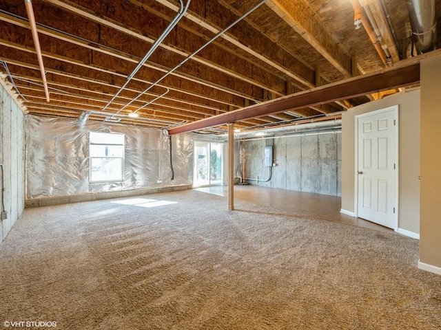 basement featuring carpet flooring