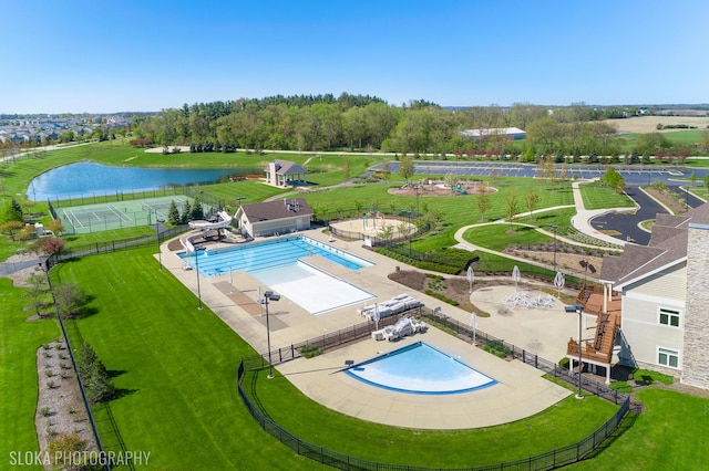 bird's eye view with a water view